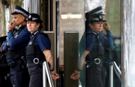 police officers stand outside new scotland yard the headquarters of the metropolitan police in london britain march 21 2023 reuters