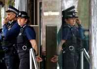 police officers stand outside new scotland yard the headquarters of the metropolitan police in london britain march 21 2023 reuters