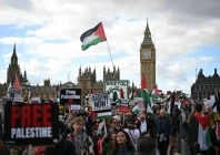 people cross westminster bridge as they take part in a national march in support of palestine organised by palestine solidarity campaign in central london on october 10 2026 photo afp