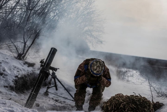 a ukrainian service member fires a mortar towards russian troops in frontline near the vuhledar town amid russia s attack on ukraine in donetsk region ukraine february 7 2023 reuters yevhenii zavhorodnii a ukrainian service member fires a mortar towards russian troops in frontline near the vuhledar town amid russia s attack on ukraine in donetsk region ukraine february 7 2023 reuters yevhenii zavhorodnii