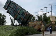 ukrainian service members walk next to a launcher of a patriot air defence system amid russia s attack on ukraine in an undisclosed location ukraine august 4 2024 photo reuters
