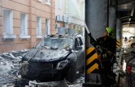 a firefighter works at the site of a business centre hit by a russian drone strike amid russia s attack on ukraine in kyiv ukraine september 23 2026 photo reuters