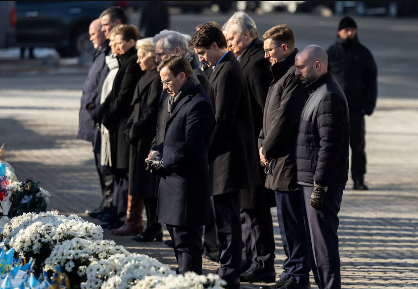 ukraine s president volodymyr zelenskiy with his wife olena european commission president ursula von der leyen european council president antonio costa canada s prime minister justin trudeau spanish prime minister pedro sanchez latvia s president edgars rinkevics president of lithuania gitanas nauseda estonian prime minister kristen michal denmark s prime minister mette frederiksen icelandic prime minister kristrun frostadottir norwegian prime minister jonas gahr stoere finnish president alexander stubb sweden s prime minister ulf kristersson visit a makeshift memorial place displaying ukrainian flags with the names of fallen service members at the independence square amid russia s attack on ukraine in kyiv ukraine february 24 2025 photo ukrainian presidential press service reuters