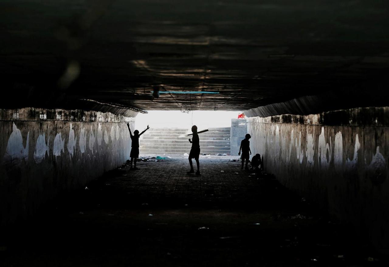 a reuters file image of kids playing in an underpass