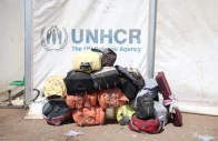 bags belonging to afghan nationals deported from iran lie beside a unhcr tent at a camp for returning migrants near the islam qala border crossing in herat province afghanistan july 22 2025 photo reuters