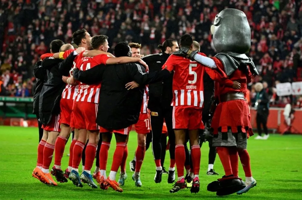 behrens sends union into german cup quarters