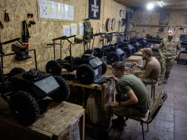 military mechanic with the call sign chimera watches fellow soldiers of nc13 a unit of ukraine s third army corps that specializes in the combat use of unmanned ground vehicles ugv prepare new vehicles for field use in a workshop in the kharkiv region ukraine on may 22 2026 photo reuters military mechanic with the call sign chimera watches fellow soldiers of nc13 a unit of ukraine s third army corps that specializes in the combat use of unmanned ground vehicles ugv prepare new vehicles for field use in a workshop in the kharkiv region ukraine on may 22 2026 photo reuters
