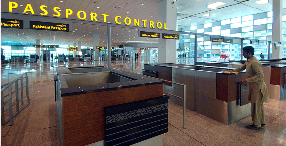 Labourers giving final touches to newly constructed international airport. Photo: APP