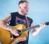 zach bryan sports free palestine shirt during performance