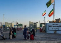 pakistani pilgrims evacuated from iran walk across the pakistan iran border at taftan in balochistan province on june 18 2025 photo afp