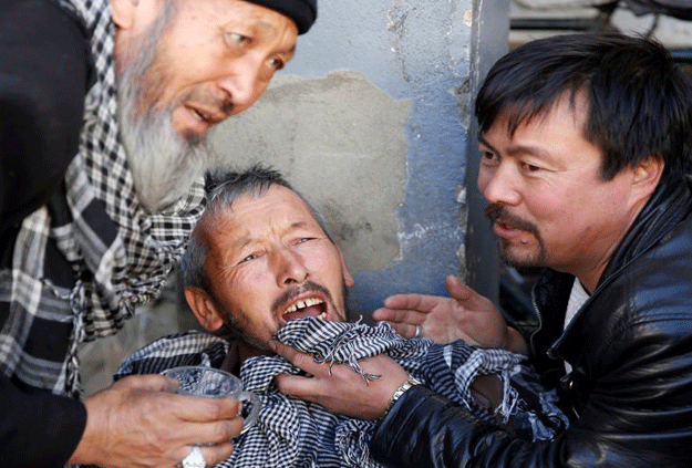 an afghan man mourns inside a hospital compound after a suicide attack in kabul afghanistan december 28 2017 photo reuters