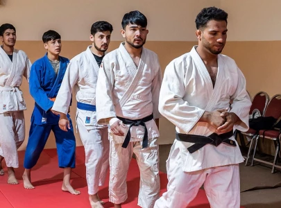 lone olympian pursues judo dream amidst taliban rule in afghanistan