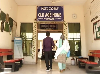 women at old age home await loved ones women at old age home await loved ones