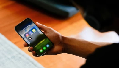 a high school student poses with his mobile phone showing his social media applications in melbourne australia photos reuters