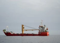 a vessel at the strait of hormuz off the coast of oman s musandam province april 12 2026 photo reuters