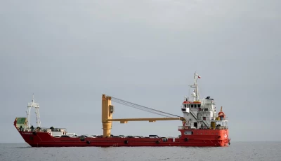a vessel at the strait of hormuz off the coast of oman s musandam province april 12 2026 photo reuters