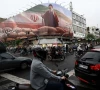 people ride motorcycles near a billboard featuring an image of iran s new supreme leader mojtaba khamenei amid a ceasefire between u s and iran in tehran iran april 20 2026 photo reuters