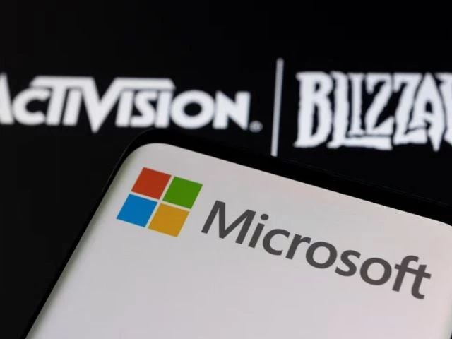 microsoft logo is seen on a smartphone placed on displayed activision blizzard logo in this illustration photo reuter microsoft logo is seen on a smartphone placed on displayed activision blizzard logo in this illustration photo reuter