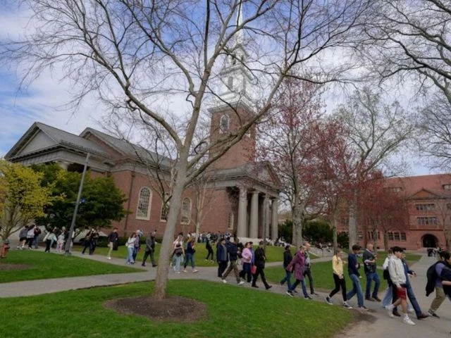 students walk on the campus of harvard university in cambridge massachusetts u s april 15 2025 photo reuters students walk on the campus of harvard university in cambridge massachusetts u s april 15 2025 photo reuters