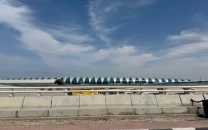 fire near dubai airport under control after drone attack authorities say