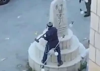 israeli lawmaker tzvi succot on tuesday smashed a memorial bearing the names of palestinians killed in the occupied west bank village of madama photo anadolu agency