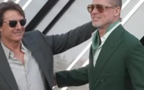 tom cruise and brad pitt rev up the glam at f1 premiere