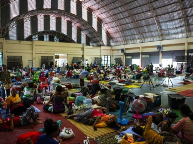 people rest inside a temporary shelter in srisaket province after thailand and cambodia exchanged heavy artillery fire for a second day on friday as border fighting intensified and spread while cambodia s leader said thailand had agreed to a malaysian ceasefire proposal but then backed down thailand july 26 2025 source reuters