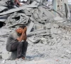 a palestinian man reacts to the destruction after an israeli strike on the sheikh radwan health centre run by the united nations relief and works agency for palestine refugees unrwa in the north of gaza city on august 6 2025 photo afp