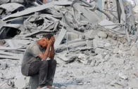 a palestinian man reacts to the destruction after an israeli strike on the sheikh radwan health centre run by the united nations relief and works agency for palestine refugees unrwa in the north of gaza city on august 6 2025 photo afp