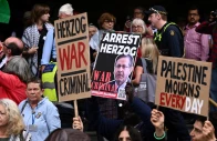 demonstrators gather during a protest against israeli president isaac herzog s visit to australia at flinders street station in melbourne australia february 9 2026 source reuters