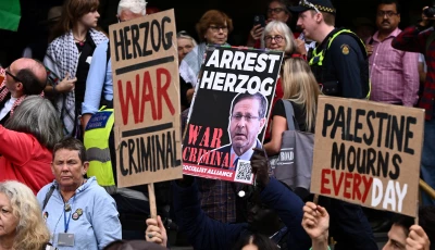 demonstrators gather during a protest against israeli president isaac herzog s visit to australia at flinders street station in melbourne australia february 9 2026 source reuters