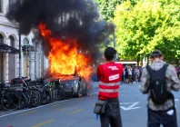 a tesla car burns during a protest against the upcoming g7 summit in evian les bains in france in geneva switzerland june 14 2026 photo reuters