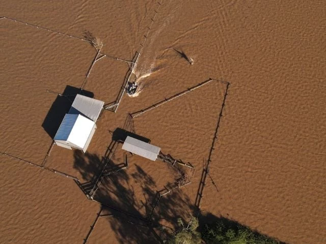 drone view shows a boat approaching a flooded shed at a stud farm near the hunter river in heatherbrae australia may 24 2025 photo reuters drone view shows a boat approaching a flooded shed at a stud farm near the hunter river in heatherbrae australia may 24 2025 photo reuters