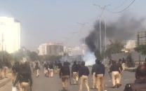 police protesters clash in karachi after iran s khamenei killed in us israeli strike