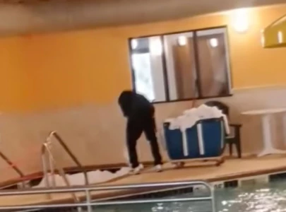 north dakota hotel under investigation after worker caught washing sheets in hot tub