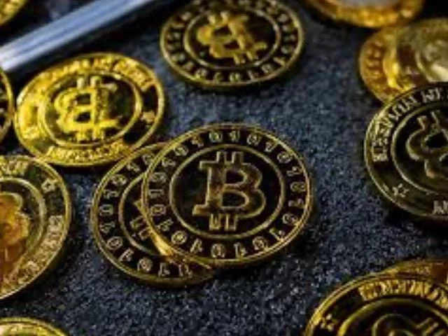 bitcoin coins are seen at a stand during the bitcoin conference 2023 in miami beach florida u s may 19 2023 photo reuters bitcoin coins are seen at a stand during the bitcoin conference 2023 in miami beach florida u s may 19 2023 photo reuters