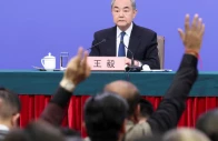members of the media raise hands to ask questions as chinese foreign minister wang yi holds a press conference on the sidelines of the national people s congress npc in beijing china march 8 2026 photo reuters