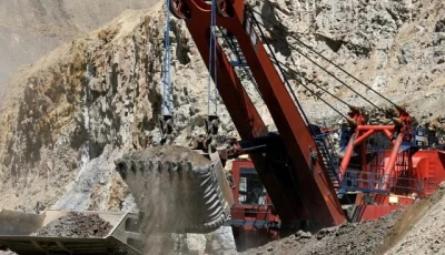 a mining shovel loads a mining truck at the los bronces copper mine photo reuter