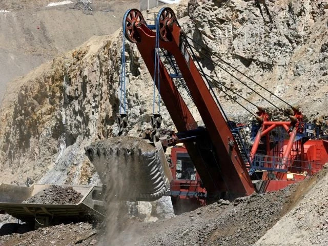 a mining shovel loads a mining truck at the los bronces copper mine photo reuter a mining shovel loads a mining truck at the los bronces copper mine photo reuter