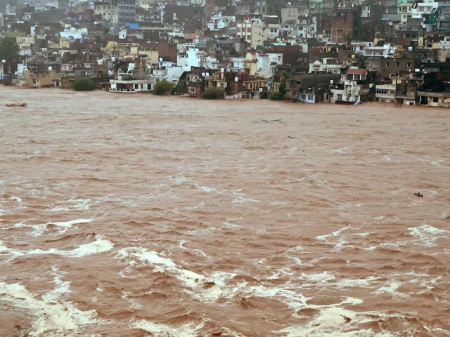 water flows down the overflowing tawi river following heavy rain in indian illegally occupied jammu and kashmir august 26 2025 photo reuters water flows down the overflowing tawi river following heavy rain in indian illegally occupied jammu and kashmir august 26 2025 photo reuters