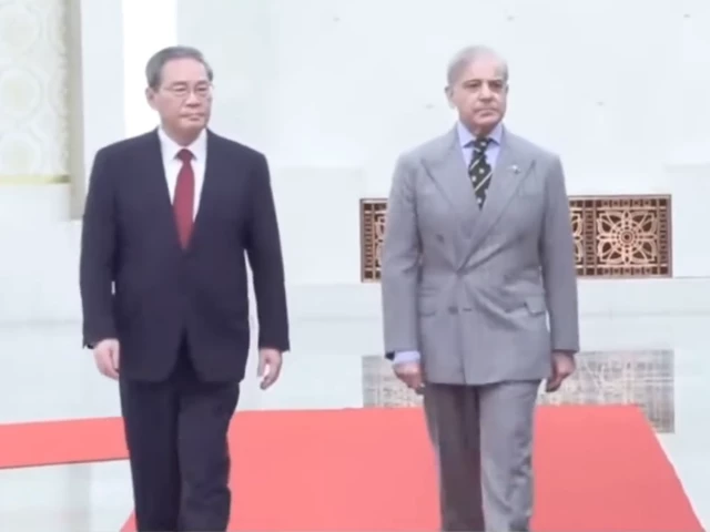 prime minister shehbaz sharif with his chinese counterpart li qiang at the great hall of the people in beijing screengrab prime minister shehbaz sharif with his chinese counterpart li qiang at the great hall of the people in beijing screengrab
