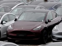 tesla electric vehicles are pictured at one of the company s delivery centers in valenton near paris france april 24 2025 reuters