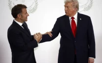 trump s intense 26 second handshake with macron turns into viral tug of war spectacle trump s intense 26 second handshake with macron turns into viral tug of war spectacle