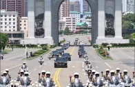 escorted by a convoy of motorcycles the motorcade of xi jinping general secretary of the communist party of china central committee and chinese president passed through the arch of triumph in pyongyang photo xinhua