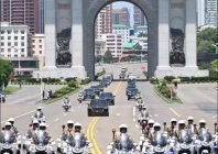 escorted by a convoy of motorcycles the motorcade of xi jinping general secretary of the communist party of china central committee and chinese president passed through the arch of triumph in pyongyang photo xinhua