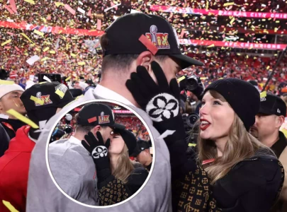 taylor swift celebrates travis kelce s chiefs win with kisses as team heads to super bowl