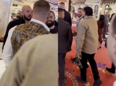 conor mcgregor spits at fan after let s go khabib taunt