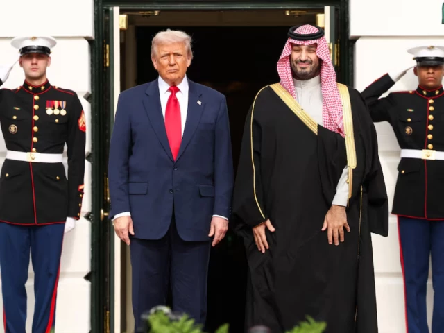 us president donald trump stands next to saudi crown prince and prime minister mohammed bin salman during an arrival ceremony on the south lawn of the white house in washington dc us november 18 2025