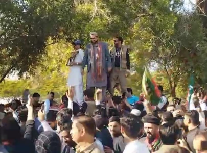 k p cm afridi arrives in karachi greeted by ppp minister