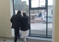 lawyer duo imaan mazari and hadi ali chattha overlooking the islamabad police stationed outside islamabad high court bar president s office waiting to arrest the couple photo express